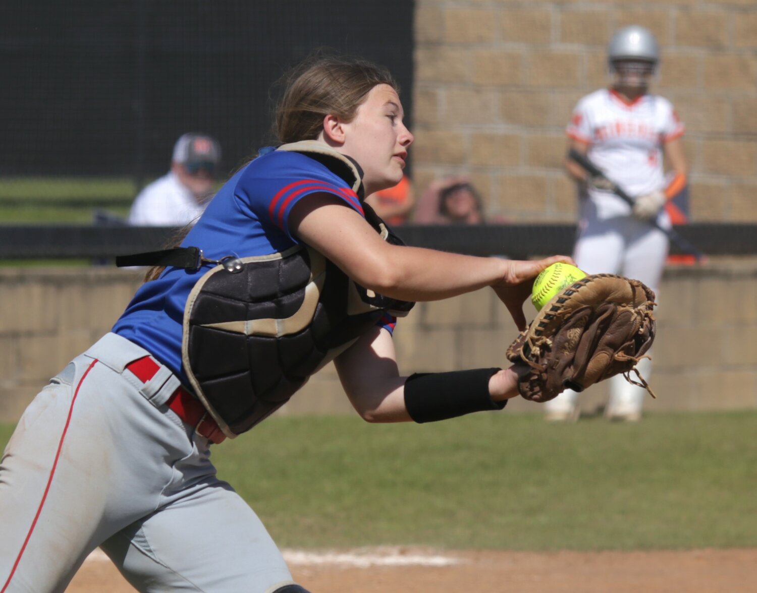 Lady Bulldog catcher Larkin Spears comes out from behind the plate to make a great catch.